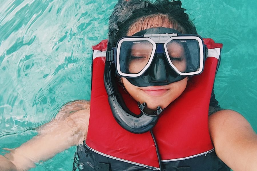 women with diving snorkel